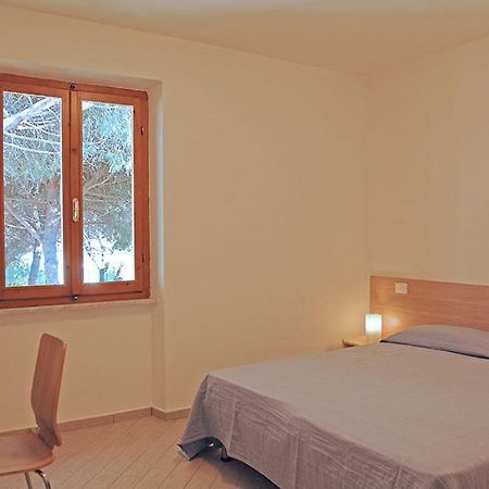Appartamenti Casa Pineta Marina di Campo Szoba fotó