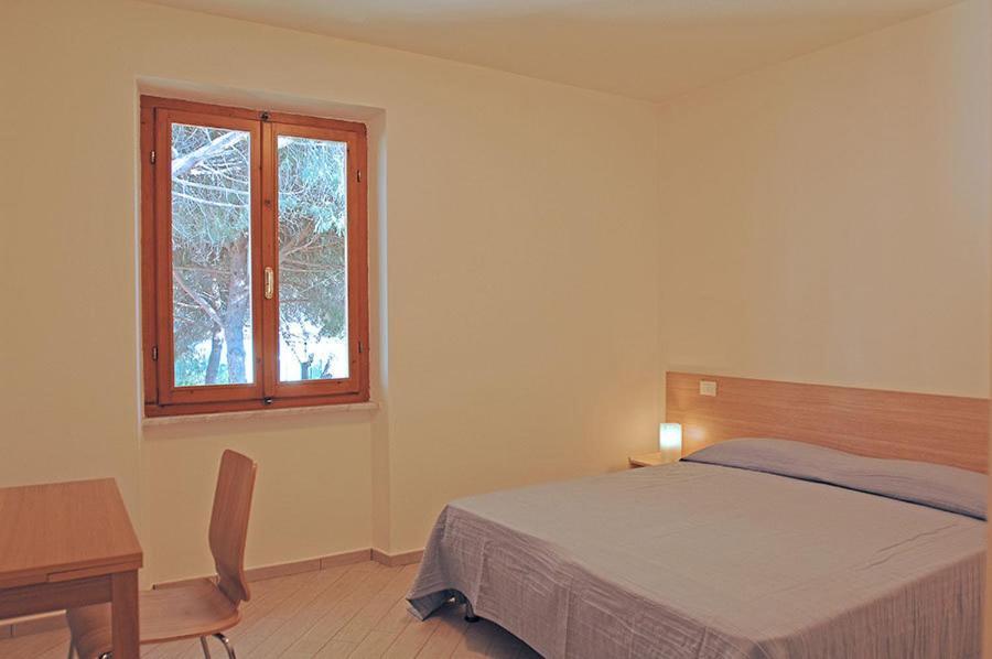 Appartamenti Casa Pineta Marina di Campo Szoba fotó