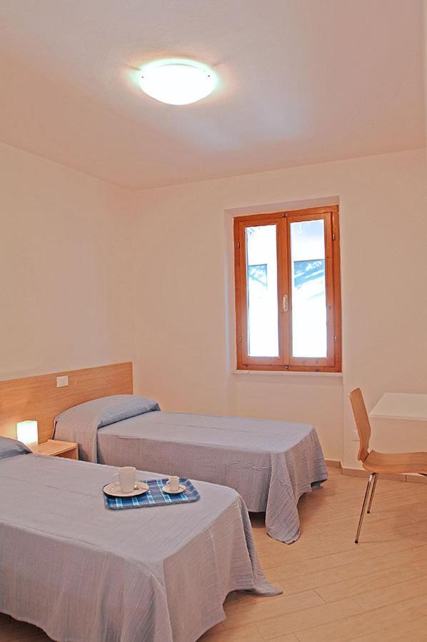 Appartamenti Casa Pineta Marina di Campo Szoba fotó